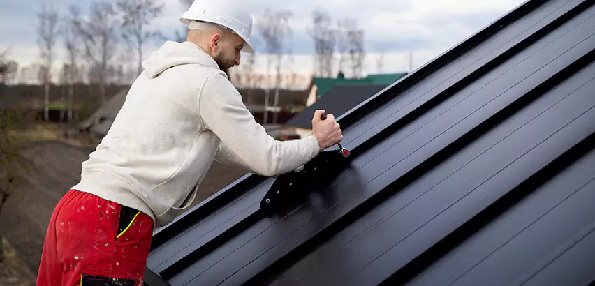 Tin Roof Ridge Cap Installation in Seattle